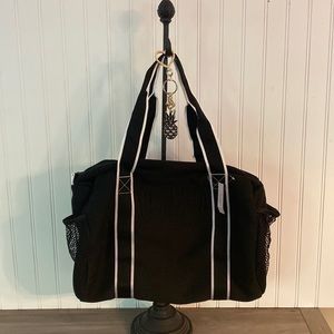 Victoria’s Sport black cotton knit small duffle bag with bonus keychain.